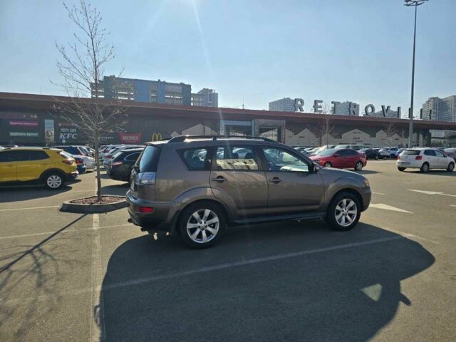 Коричневый Мицубиси Аутлендер, объемом двигателя 2.4 л и пробегом 270 тыс. км за 10300 $, фото 2 на Automoto.ua