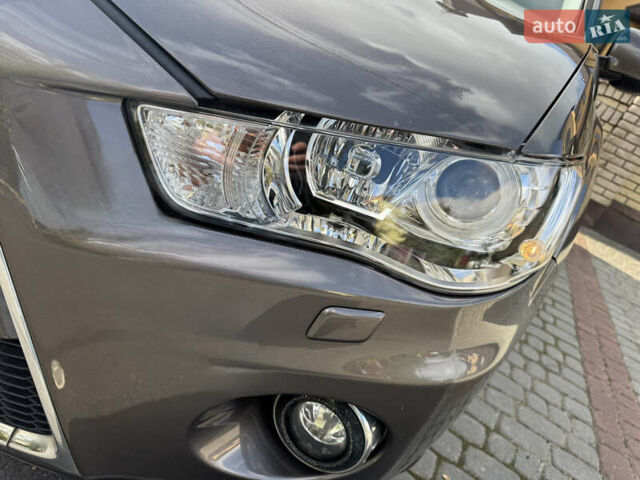 Коричневий Міцубісі Аутлендер, об'ємом двигуна 2.2 л та пробігом 165 тис. км за 12600 $, фото 12 на Automoto.ua