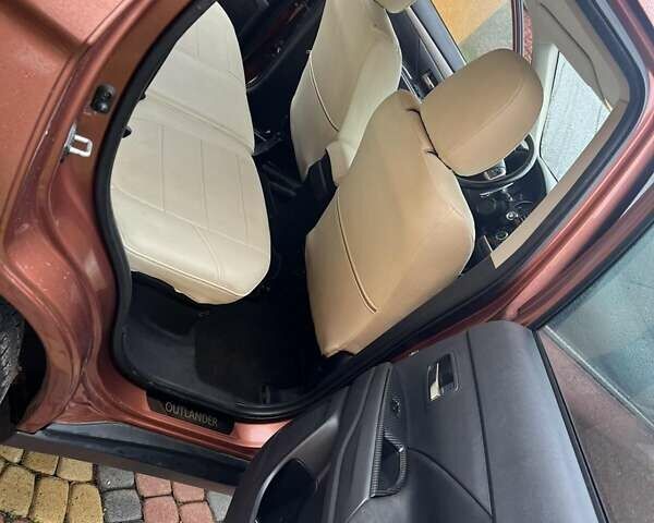 Коричневый Мицубиси Аутлендер, объемом двигателя 2.3 л и пробегом 317 тыс. км за 13000 $, фото 8 на Automoto.ua