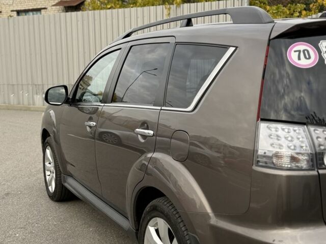 Коричневый Мицубиси Аутлендер, объемом двигателя 2.4 л и пробегом 191 тыс. км за 10900 $, фото 8 на Automoto.ua