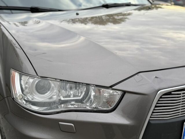 Коричневый Мицубиси Аутлендер, объемом двигателя 2.4 л и пробегом 191 тыс. км за 10900 $, фото 17 на Automoto.ua