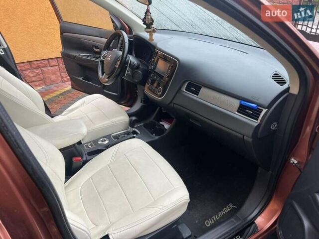 Коричневый Мицубиси Аутлендер, объемом двигателя 2.3 л и пробегом 317 тыс. км за 13000 $, фото 9 на Automoto.ua