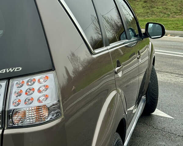 Коричневий Міцубісі Аутлендер, об'ємом двигуна 2.2 л та пробігом 197 тис. км за 11750 $, фото 12 на Automoto.ua