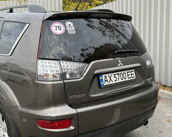 Коричневый Мицубиси Аутлендер, объемом двигателя 2.36 л и пробегом 191 тыс. км за 10900 $, фото 9 на Automoto.ua