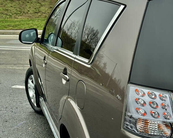 Коричневий Міцубісі Аутлендер, об'ємом двигуна 2.2 л та пробігом 197 тис. км за 11750 $, фото 11 на Automoto.ua