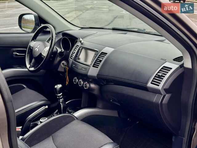 Коричневий Міцубісі Аутлендер, об'ємом двигуна 2.2 л та пробігом 197 тис. км за 11750 $, фото 32 на Automoto.ua