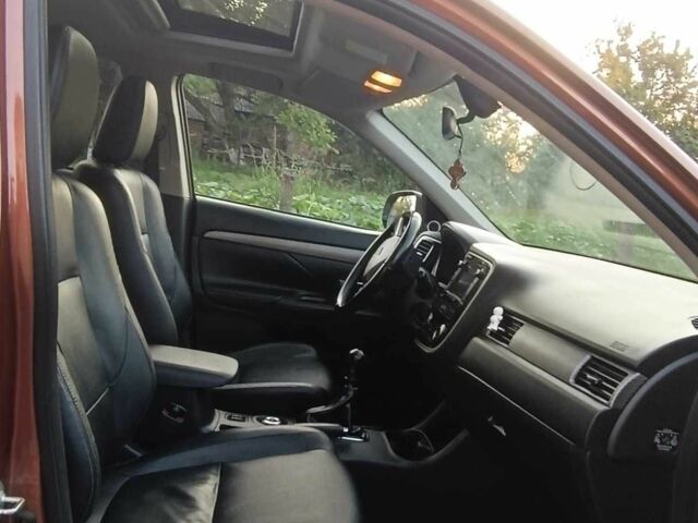 Коричневый Мицубиси Аутлендер, объемом двигателя 2.2 л и пробегом 210 тыс. км за 12500 $, фото 4 на Automoto.ua