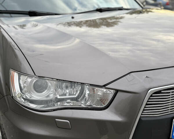 Коричневый Мицубиси Аутлендер, объемом двигателя 2.36 л и пробегом 191 тыс. км за 10900 $, фото 17 на Automoto.ua