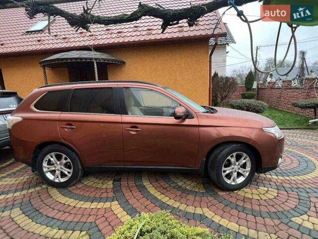 Коричневый Мицубиси Аутлендер, объемом двигателя 2.3 л и пробегом 317 тыс. км за 13000 $, фото 2 на Automoto.ua