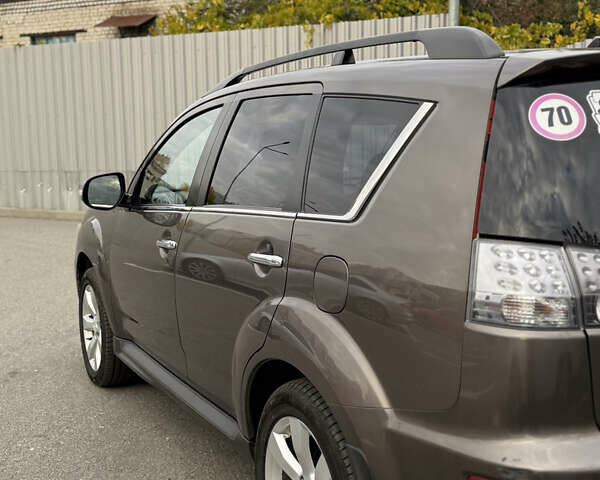 Коричневый Мицубиси Аутлендер, объемом двигателя 2.36 л и пробегом 191 тыс. км за 10900 $, фото 8 на Automoto.ua