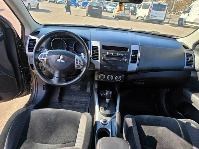 Коричневый Мицубиси Аутлендер, объемом двигателя 2.4 л и пробегом 270 тыс. км за 10300 $, фото 3 на Automoto.ua