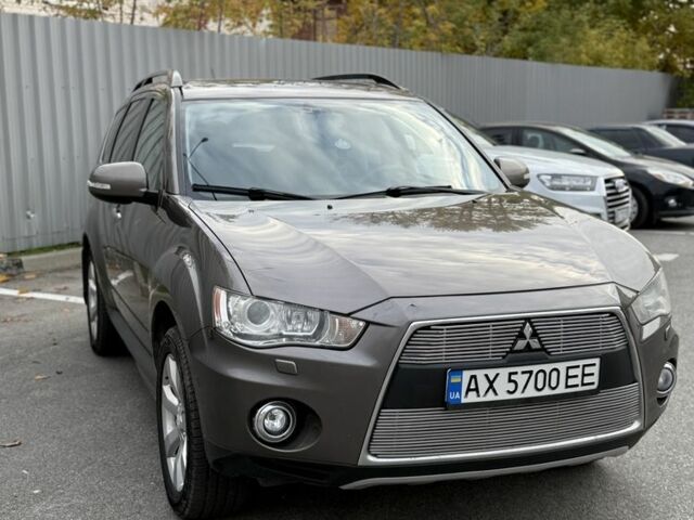 Коричневый Мицубиси Аутлендер, объемом двигателя 2.4 л и пробегом 191 тыс. км за 10900 $, фото 1 на Automoto.ua