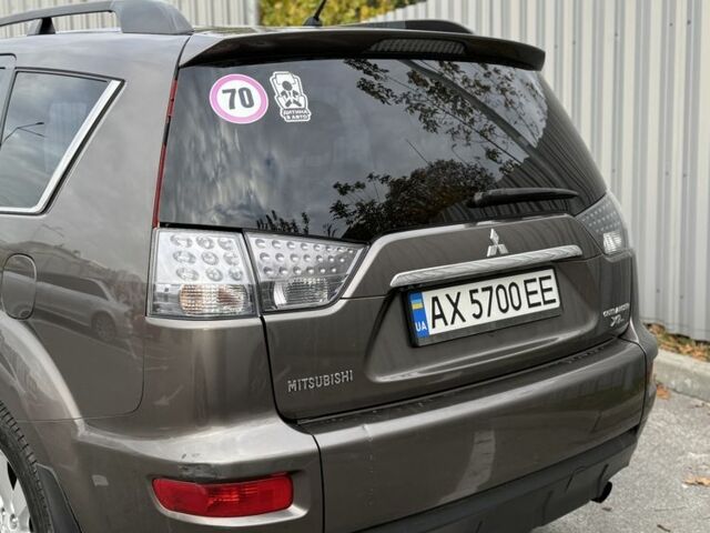 Коричневый Мицубиси Аутлендер, объемом двигателя 2.4 л и пробегом 191 тыс. км за 10900 $, фото 9 на Automoto.ua