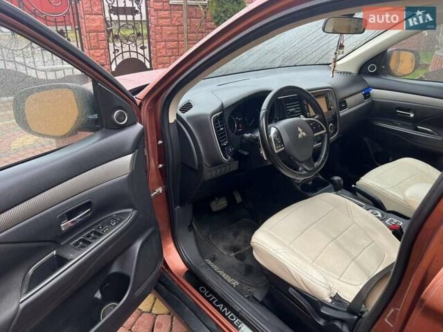 Коричневый Мицубиси Аутлендер, объемом двигателя 2.3 л и пробегом 317 тыс. км за 13000 $, фото 7 на Automoto.ua