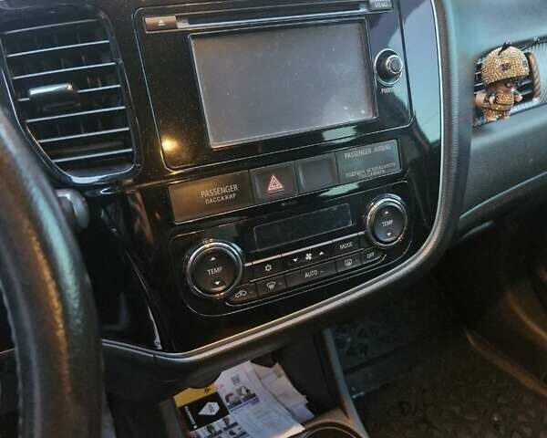 Коричневый Мицубиси Аутлендер, объемом двигателя 2.4 л и пробегом 136 тыс. км за 13000 $, фото 12 на Automoto.ua