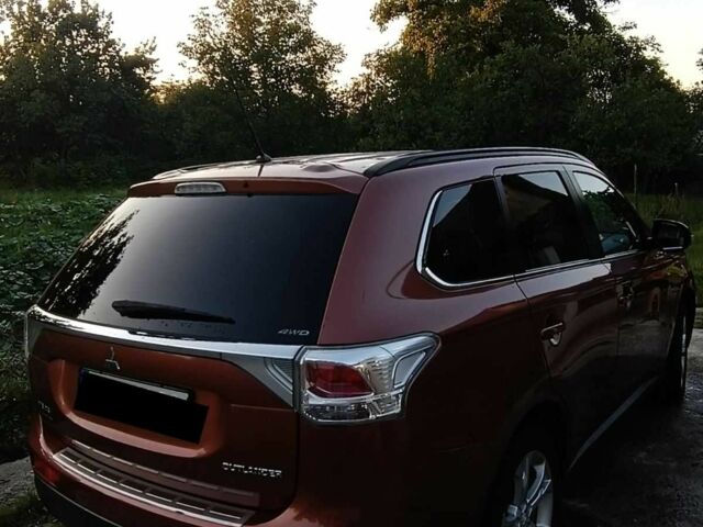 Коричневый Мицубиси Аутлендер, объемом двигателя 2.2 л и пробегом 210 тыс. км за 12500 $, фото 2 на Automoto.ua