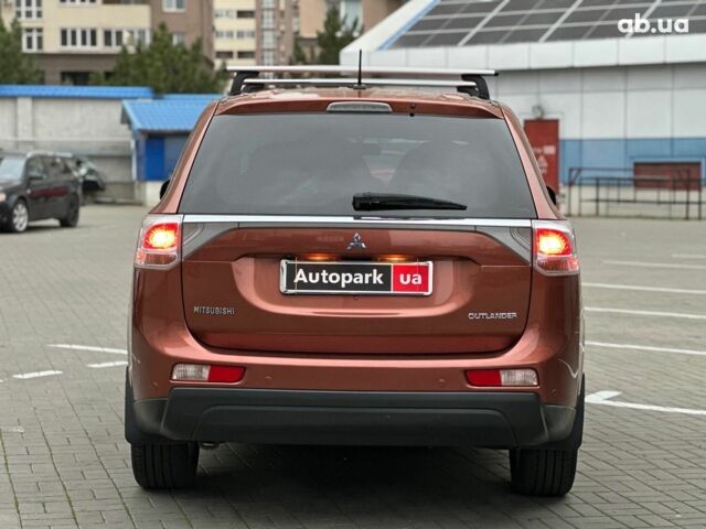 Коричневый Мицубиси Аутлендер, объемом двигателя 2.4 л и пробегом 267 тыс. км за 11990 $, фото 4 на Automoto.ua