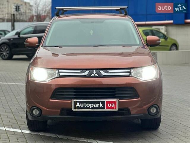 Коричневий Міцубісі Аутлендер, об'ємом двигуна 2.4 л та пробігом 267 тис. км за 11990 $, фото 1 на Automoto.ua