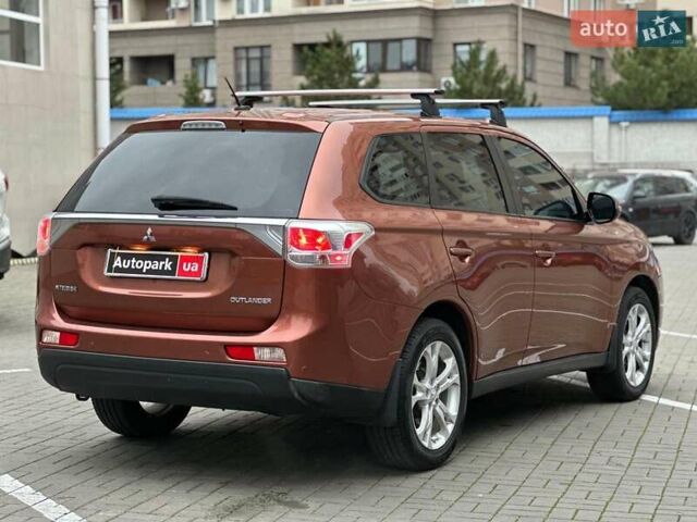 Коричневий Міцубісі Аутлендер, об'ємом двигуна 2.4 л та пробігом 267 тис. км за 11990 $, фото 3 на Automoto.ua