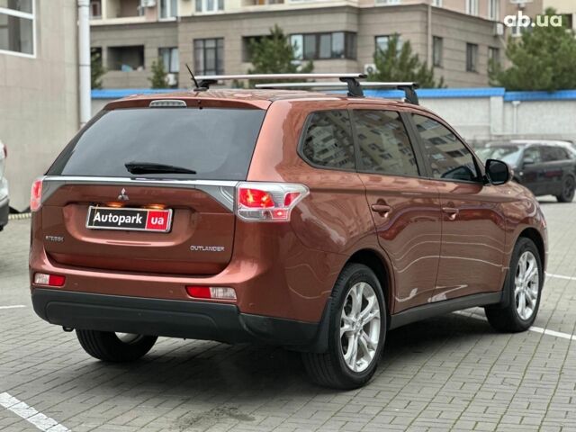 Коричневый Мицубиси Аутлендер, объемом двигателя 2.4 л и пробегом 267 тыс. км за 11990 $, фото 3 на Automoto.ua
