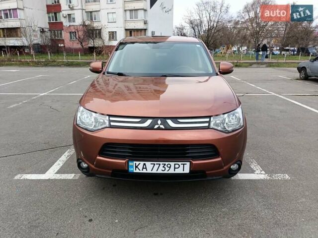 Коричневый Мицубиси Аутлендер, объемом двигателя 2.4 л и пробегом 154 тыс. км за 13700 $, фото 1 на Automoto.ua