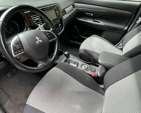 Коричневый Мицубиси Аутлендер, объемом двигателя 2.4 л и пробегом 126 тыс. км за 11500 $, фото 3 на Automoto.ua