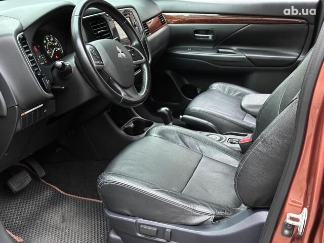 Коричневый Мицубиси Аутлендер, объемом двигателя 2.4 л и пробегом 267 тыс. км за 11990 $, фото 8 на Automoto.ua