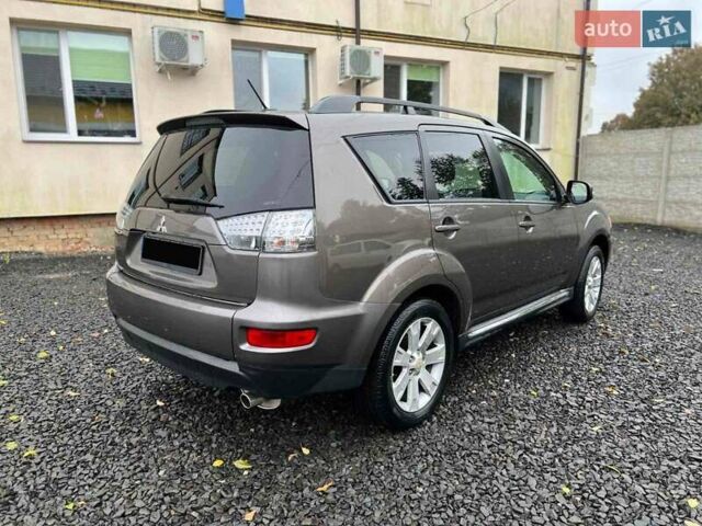 Коричневий Міцубісі Аутлендер, об'ємом двигуна 2.4 л та пробігом 270 тис. км за 9000 $, фото 2 на Automoto.ua