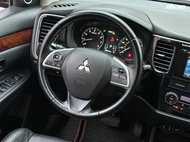 Коричневый Мицубиси Аутлендер, объемом двигателя 2.4 л и пробегом 267 тыс. км за 11990 $, фото 19 на Automoto.ua