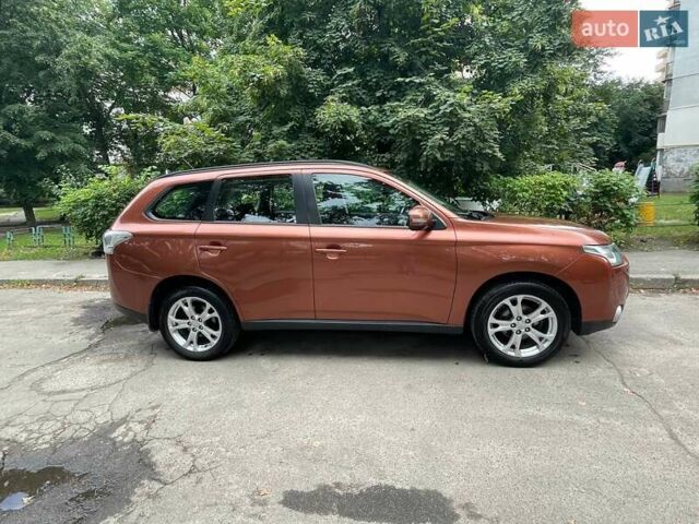 Коричневый Мицубиси Аутлендер, объемом двигателя 2.4 л и пробегом 126 тыс. км за 11500 $, фото 2 на Automoto.ua