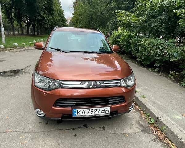 Коричневый Мицубиси Аутлендер, объемом двигателя 2.4 л и пробегом 126 тыс. км за 11500 $, фото 1 на Automoto.ua