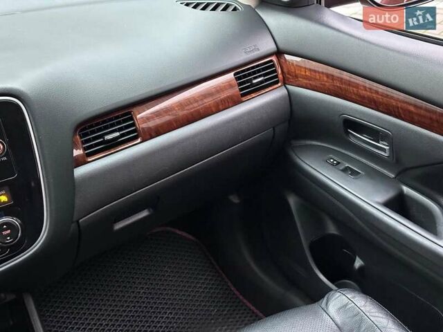 Коричневий Міцубісі Аутлендер, об'ємом двигуна 2.4 л та пробігом 267 тис. км за 11990 $, фото 18 на Automoto.ua