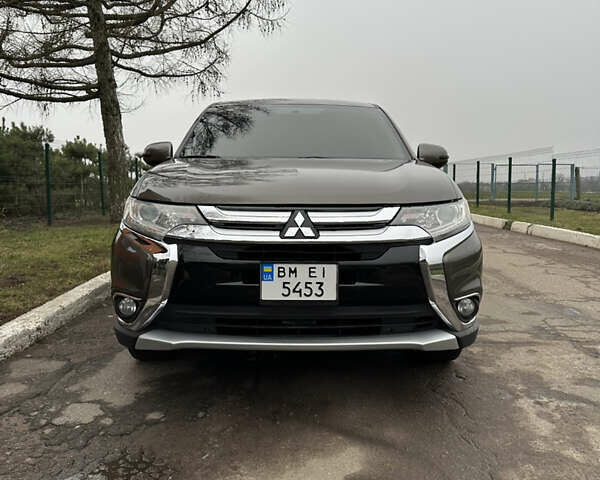 Коричневий Міцубісі Аутлендер, об'ємом двигуна 2.36 л та пробігом 197 тис. км за 14000 $, фото 6 на Automoto.ua