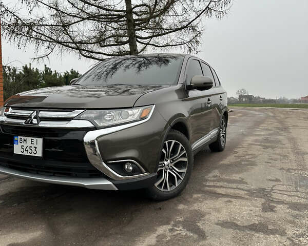 Коричневий Міцубісі Аутлендер, об'ємом двигуна 2.36 л та пробігом 197 тис. км за 14000 $, фото 2 на Automoto.ua