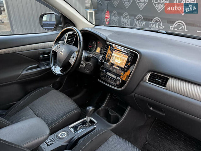 Коричневий Міцубісі Аутлендер, об'ємом двигуна 3 л та пробігом 170 тис. км за 14800 $, фото 12 на Automoto.ua