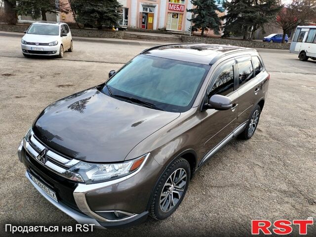 Коричневий Міцубісі Аутлендер, об'ємом двигуна 2.4 л та пробігом 151 тис. км за 14900 $, фото 7 на Automoto.ua