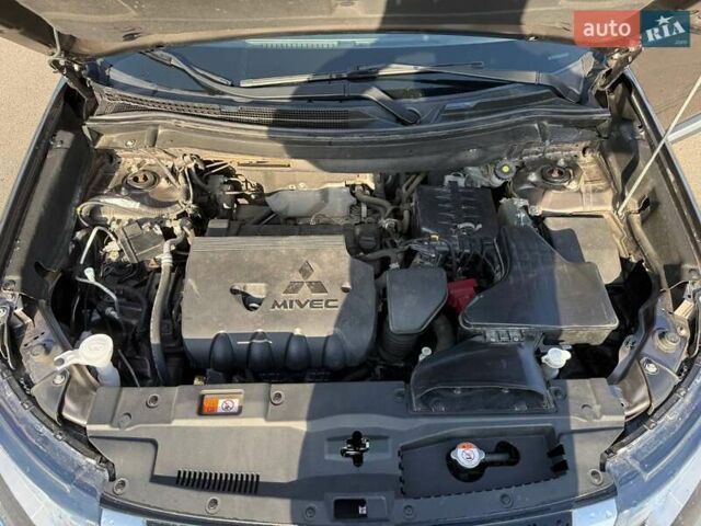 Коричневий Міцубісі Аутлендер, об'ємом двигуна 2.36 л та пробігом 128 тис. км за 15500 $, фото 12 на Automoto.ua