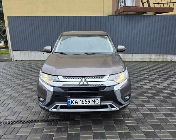 Коричневий Міцубісі Аутлендер, об'ємом двигуна 2.4 л та пробігом 129 тис. км за 12799 $, фото 8 на Automoto.ua
