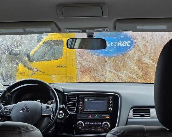 Коричневий Міцубісі Аутлендер, об'ємом двигуна 2.4 л та пробігом 129 тис. км за 12799 $, фото 26 на Automoto.ua