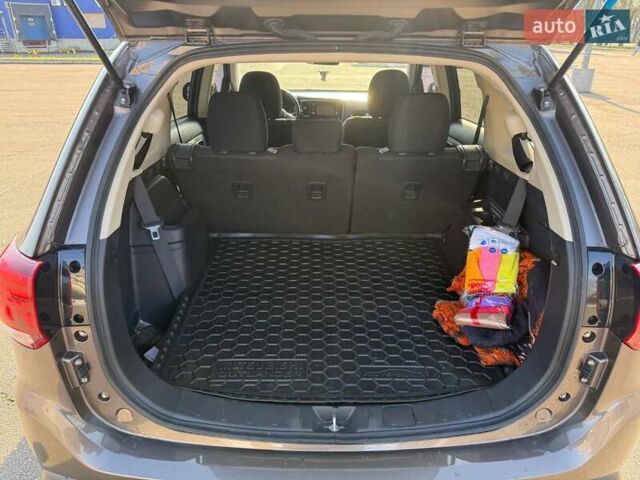 Коричневий Міцубісі Аутлендер, об'ємом двигуна 2.36 л та пробігом 128 тис. км за 15500 $, фото 11 на Automoto.ua