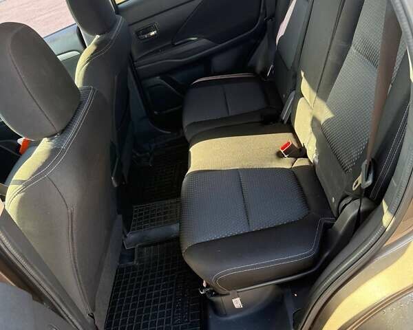 Коричневий Міцубісі Аутлендер, об'ємом двигуна 2.36 л та пробігом 128 тис. км за 15500 $, фото 9 на Automoto.ua