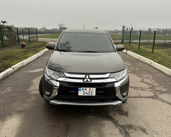 Коричневий Міцубісі Аутлендер, об'ємом двигуна 2.36 л та пробігом 197 тис. км за 14000 $, фото 3 на Automoto.ua