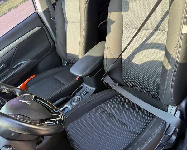 Коричневий Міцубісі Аутлендер, об'ємом двигуна 2.36 л та пробігом 128 тис. км за 15500 $, фото 3 на Automoto.ua