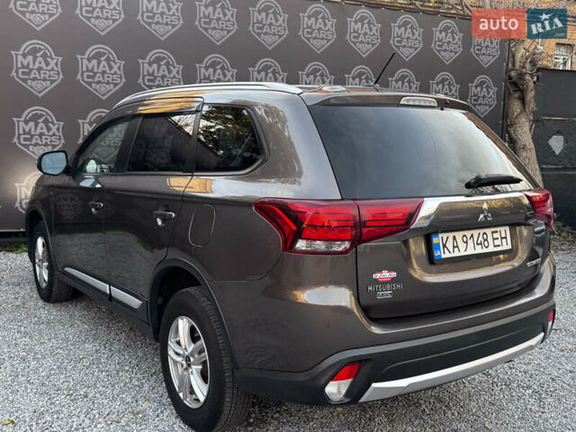 Коричневий Міцубісі Аутлендер, об'ємом двигуна 3 л та пробігом 170 тис. км за 14800 $, фото 3 на Automoto.ua