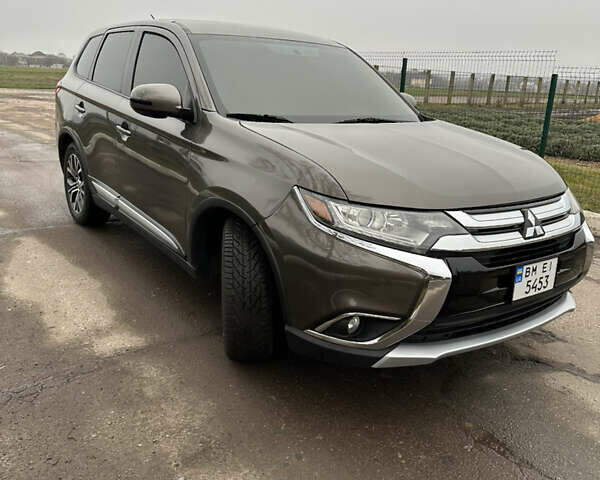 Коричневий Міцубісі Аутлендер, об'ємом двигуна 2.36 л та пробігом 197 тис. км за 14000 $, фото 4 на Automoto.ua