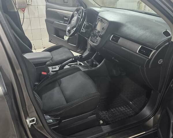 Коричневий Міцубісі Аутлендер, об'ємом двигуна 2.36 л та пробігом 176 тис. км за 15800 $, фото 2 на Automoto.ua