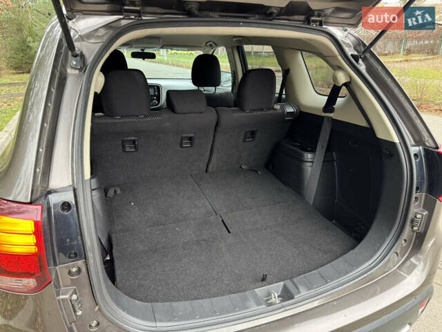 Коричневий Міцубісі Аутлендер, об'ємом двигуна 2.36 л та пробігом 167 тис. км за 12500 $, фото 10 на Automoto.ua