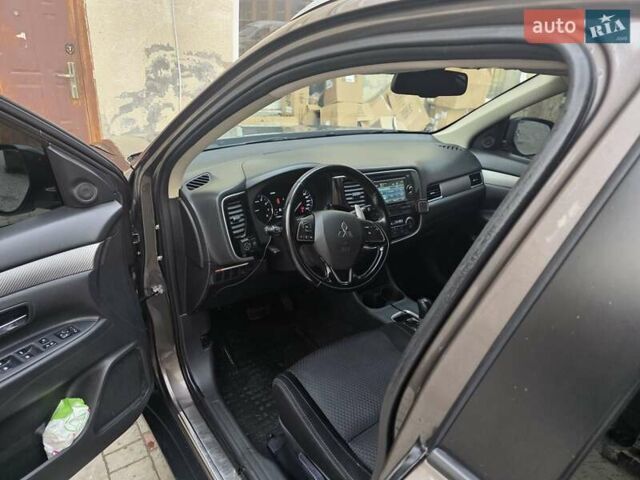 Коричневий Міцубісі Аутлендер, об'ємом двигуна 2.36 л та пробігом 176 тис. км за 15800 $, фото 5 на Automoto.ua