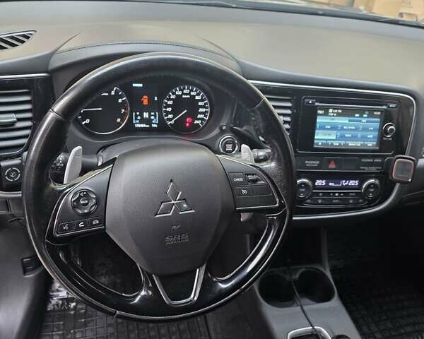 Коричневий Міцубісі Аутлендер, об'ємом двигуна 2.36 л та пробігом 176 тис. км за 15800 $, фото 1 на Automoto.ua