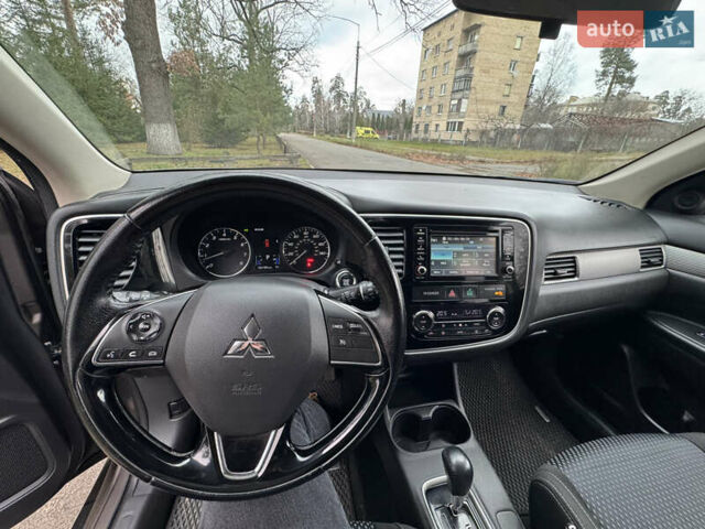 Коричневий Міцубісі Аутлендер, об'ємом двигуна 2.36 л та пробігом 167 тис. км за 12500 $, фото 3 на Automoto.ua